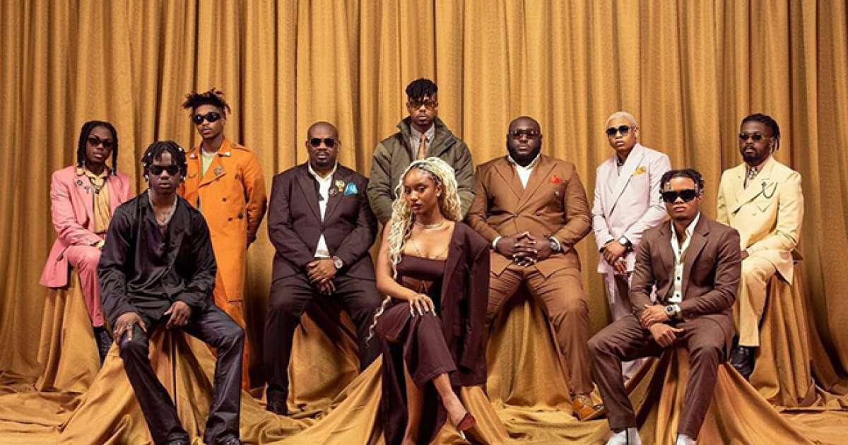 Wan-Da-Mo-Mavin.jpg A group of ten people pose in front of gold curtains, marking their 10-year anniversary album. Nine are standing, one is sitting in the center, all dressed in formal clothing in dark and neutral colors. This Nigerian afrobeats collective radiates elegance and accomplishment.