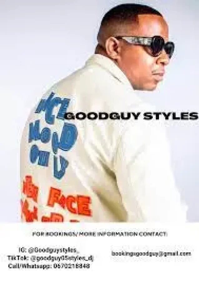 goodguy-styles-thama-tee-changes-2023_01_24_09_56_34-ubetoo.webp.webp A man wearing sunglasses and a white jacket with colorful letters on the back, showcasing his Thama Tee design. Text overlay includes his social media handles, contact email, and phone number for bookings.