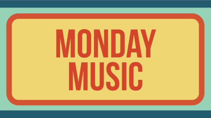 monday_music.png A rectangular sign with an orange border reads "MONDAY MUSIC" in bold red letters on a yellow background. The sign is set against a teal and green framed backdrop, embodying the uplifting Afropop spirit of the day.