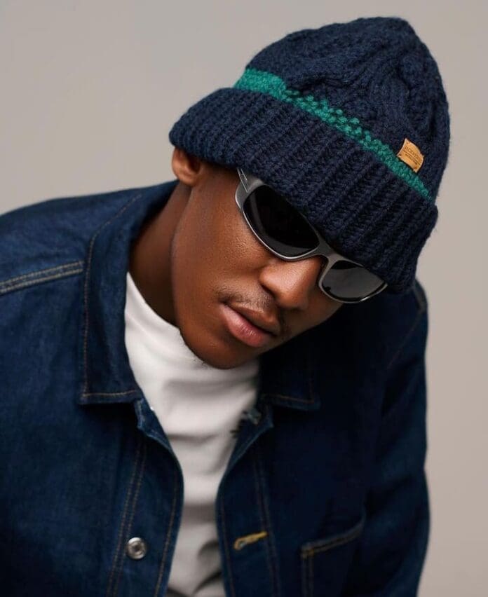 Young man, beanie, sunglasses. Young man, beanie, sunglasses.