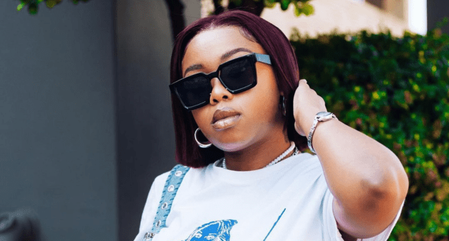 A woman wearing sunglasses reaches new Apple Music milestone. A woman wearing sunglasses reaches new Apple Music milestone.