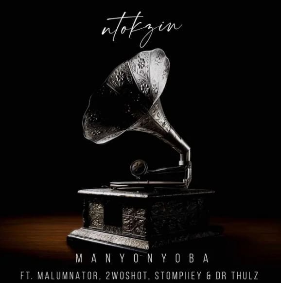 A gramophone with the words manonoya on it and featuring Stompiiey. A gramophone with the words manonoya on it and featuring Stompiiey.
