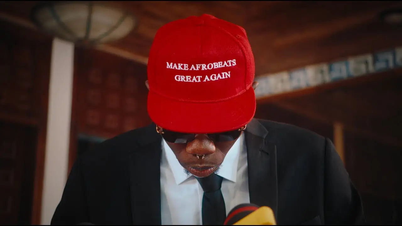 A man in a red hat is holding microphones at the best Nigerian titles of 2023 (3rd quarter). A man in a red hat is holding microphones at the best Nigerian titles of 2023 (3rd quarter).