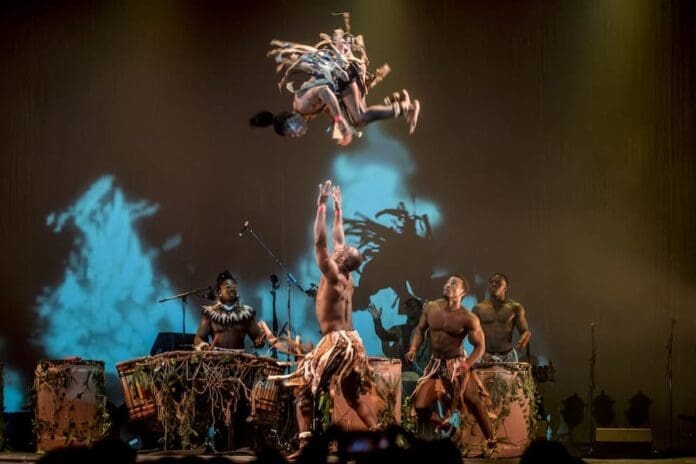 A group of African dancers from Afrique en Cirque performing on stage at Factory International in Manchester. A group of African dancers from Afrique en Cirque performing on stage at Factory International in Manchester.