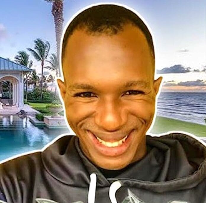 A person smiling at the camera with a large house, pool, palm trees, and ocean in the background at sunset, reminiscent of a scene from thenigerianvoice or a 2025 Music Review feature.