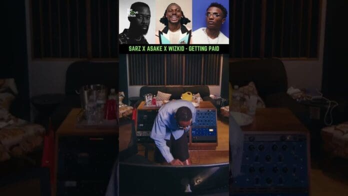 A music producer works at a mixing console in a studio; above are images of Sarz, Wizkid, and Asake with the text “SARZ X ASAKE X WIZKID - GETTING PAID.”.