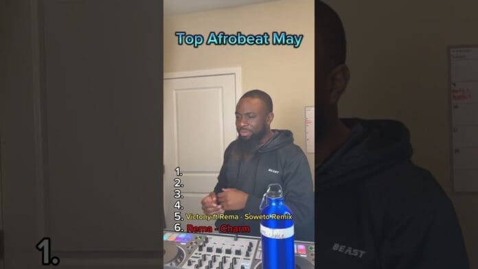 A man stands behind DJ equipment in a room with the text "Top Afrobeat May" and a playlist of top Afrobeat songs and new dances visible on the screen.