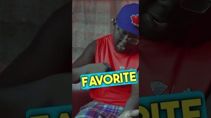A person wearing glasses, a blue cap with a red maple leaf, and a red shirt points to their arm. Bold yellow and blue text reads "FAVORITE," celebrating the latest New Jam 2023 trend.