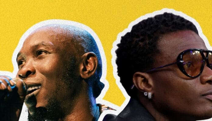 Two men are shown in profile against a yellow background; one is singing into a microphone, channeling Afrobeats energy, while the other, wearing sunglasses, looks away from the camera.