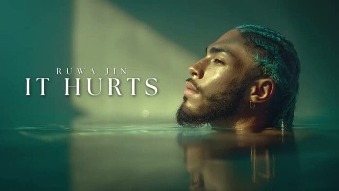 A person with braided hair and facial hair is partially submerged in water, while the text "Ruwa Jin It Hurts" appears on the left side.