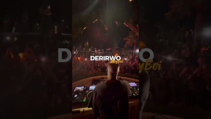 A DJ stands at a mixing console facing a large crowd at a nighttime outdoor afrohouse event, with "DERIRWO" and "2byBoi" text overlayed on the image.