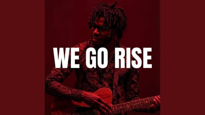 A person with dreadlocks plays guitar against a red background with large white text overlaid that reads, "WE GO RISE.