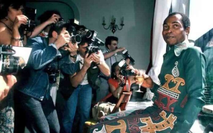 A group of people taking pictures of a man during Grammy week, capturing the excitement surrounding African music’s global domination.