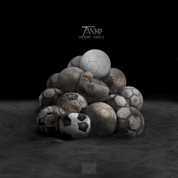 A person sits on a pile of weathered soccer balls, with one clean white ball at the top. The dark, minimal background sets the scene for "TANKO VICTONY • TERRY G," blending Afropop vibes into the striking visual.