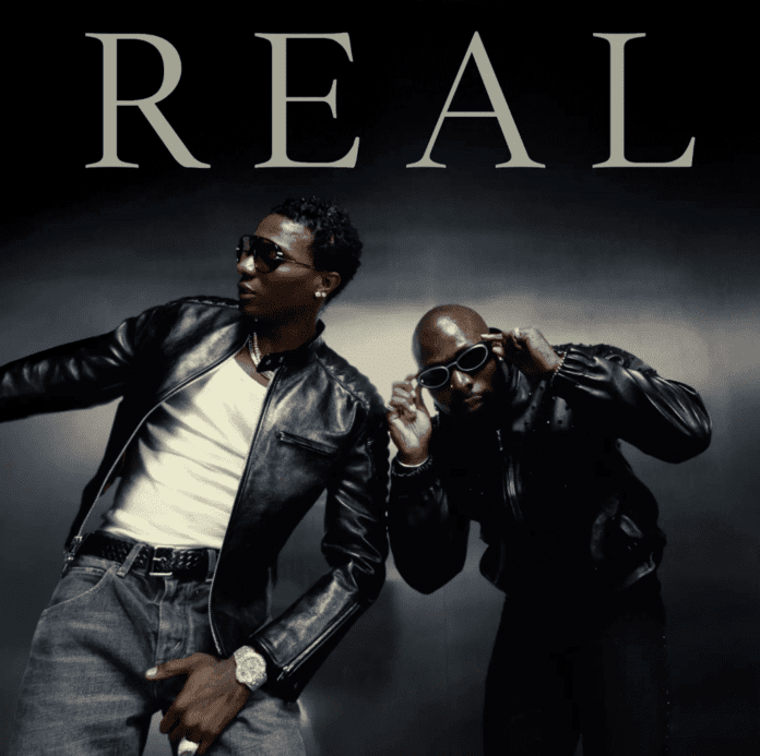 Two men wearing sunglasses and black leather jackets pose confidently under the large word "REAL" on a dark background, channeling Afrobeats icons like Wizkid with their bold style.
