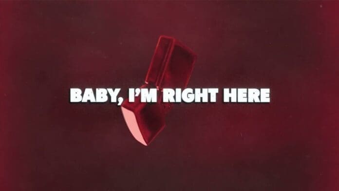 A red, tilted lipstick tube on a dark red background with white text that reads, "BABY, I'M RIGHT HERE," inspired by Joshua Baraka’s Lyric Video for “Wrong Places.”.