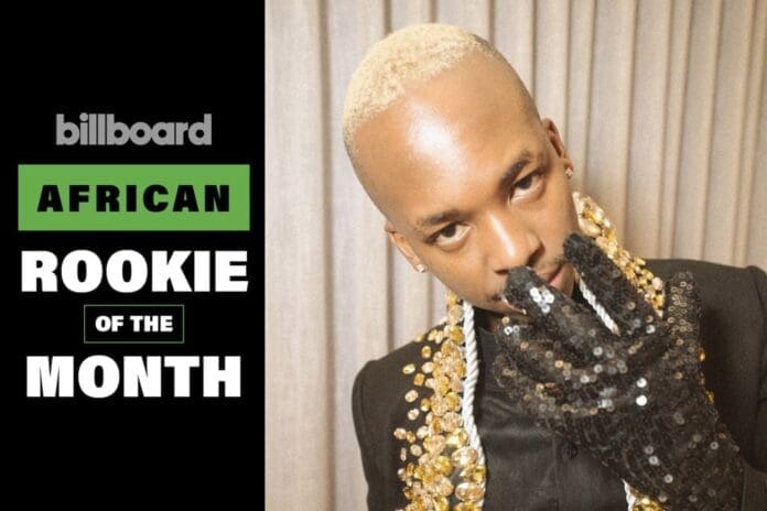 Ciza-African-Rookie-of-the-Month-2025-billboard-1800.jpg Ciza, sporting short blond hair and a sequined glove, poses next to a "Billboard African Rookie of the Month" sign.