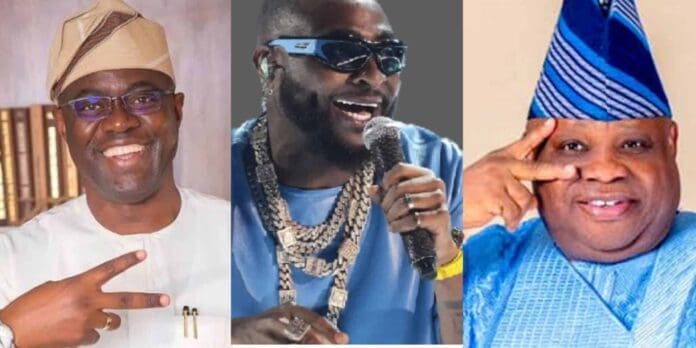 Three men are shown in a split image. Two, possibly Governors Makinde and Adeleke, wear traditional Nigerian attire and make peace signs, while the middle man, channeling a Davido Ibadan performance style, holds a microphone with sunglasses and jewelry.