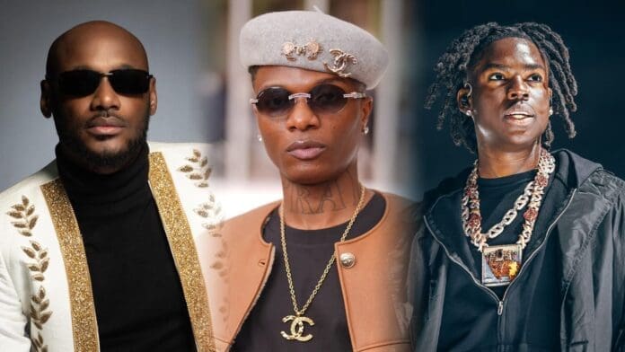 Three men standing side by side, each wearing distinctive outfits, sunglasses, and jewelry, posing for the camera against different backgrounds as if ready to top the Billboard charts with their latest Afrobeats songs.