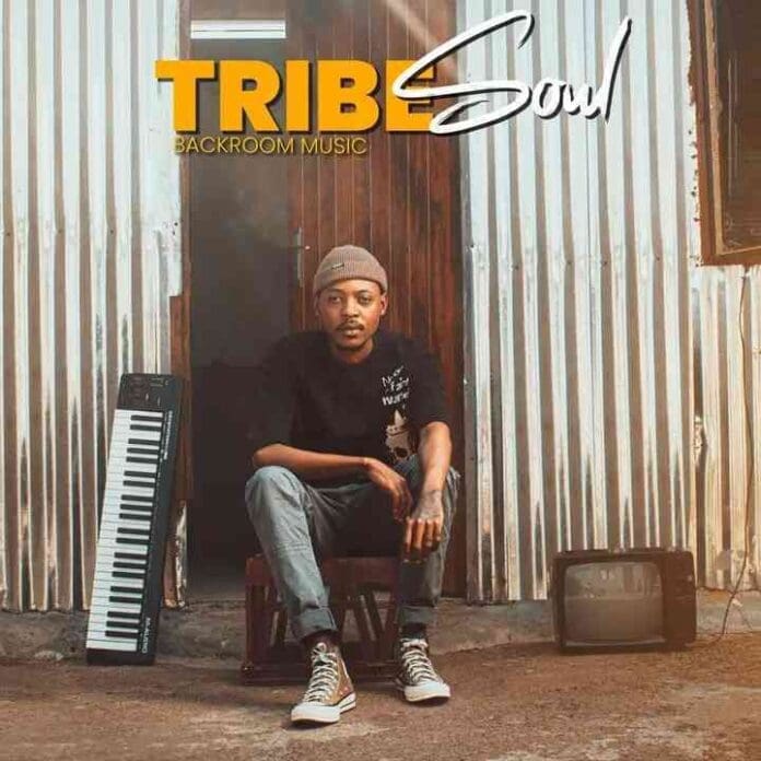 A man sits on a bench outside a corrugated metal building, with an album cover-style scene: a keyboard to his left and a small TV to his right. Above him, “TRIBESOUL BACKROOM MUSIC” highlights the essence of Backroom Music.