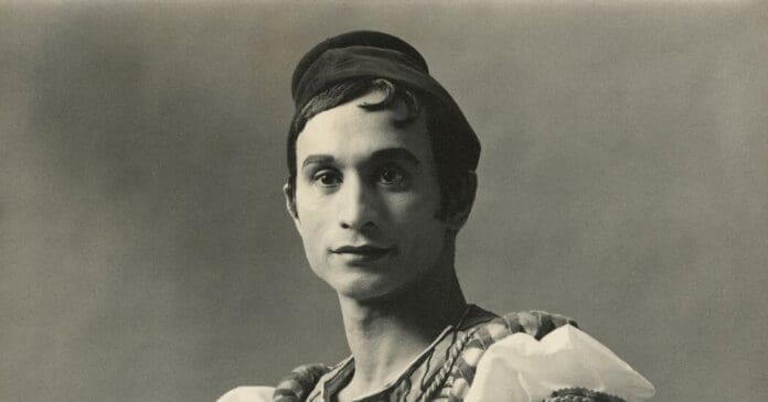 A black and white photo of a man in a costume, Johaar Mosaval, who broke free of Apartheid for ballet.