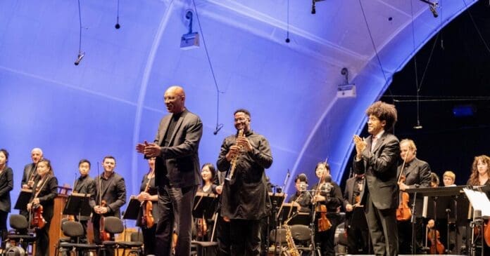 The Los Angeles Symphony Orchestra, led by renowned composer and pianist Billy Childs, performs a concert.